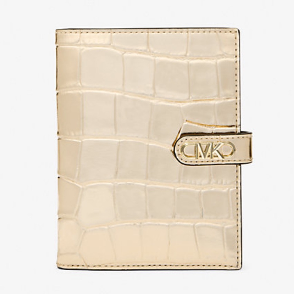 Michael Kors Empire Metallic Crocodile Embossed Leather Passport Wallet
Pale Gld